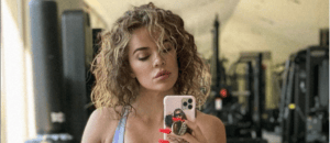 Khloe Kardashian taking a mirror selfie