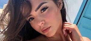 Demi Rose snaps a selfie.