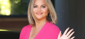 Chrissy Teigen smiling.