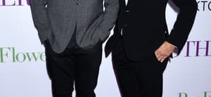 Bob Saget and John Stamos smiling.