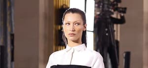 Bella Hadid walks the runway during the Sacai fashion show in Paris