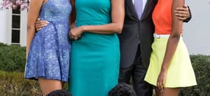 President Barack Obama, First Lady Michelle Obama, and daughters Malia and Sasha pose for a family portrait with Bo and Sunny in the Rose Garden of the White House on Easter Sunday, April 5, 2015.