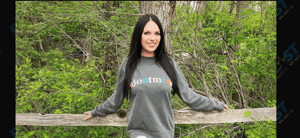 Danielle Ruhl posing on a trail