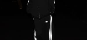 Emily Ratajkowski wears an Adidas Tracksuit while leaving the Balenciaga show in Paris