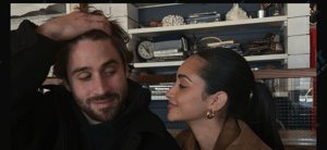 Victoria Fuller and Greg Grippo making eyes at one another.