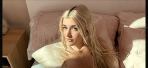 Sami Sheen Cuddles Her Cat Topless In Bed