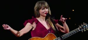Taylor Swift has to fix her dress sleeve on opening night as her wardrobe falls apart during multimilion dollar tour in Arizona