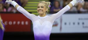 March 3, 2023: LSU's Olivia Dunne salutes prioir to her bar routine at the LSU Podium Challenge collegiate woman's gymnastics meet at the River Center in Baton Rouge, LA. Kyle Okita/CSM(Credit Image: © Kyle Okita/Cal Sport Media) Newscom/(Mega Agency TagID: csmphotothree057215.jpg) [Photo via Mega Agency]