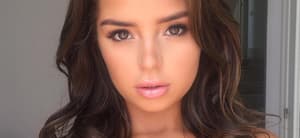 Demi Rose takes a selfie.