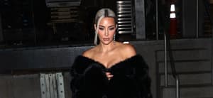 Kim Kardashian stunned in a black Faux Fur coat showing off her new platinum blonde hair at the Homeboy Industries Gala where she was honored