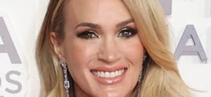 Carrie Underwood smiles at an event