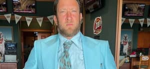 Dave Portnoy in a blue suit
