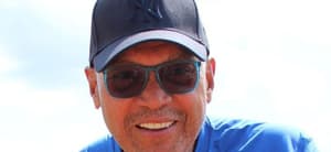 Reggie Jackson smiling in New York Yankees hat