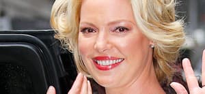 Katherine Heigl waves in the street