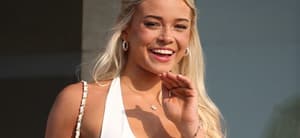Olivia Dunne appears on a balcony at the home of Michael Rubin where he and Travis Scott are hosting the 4th July White party in Bridgehampton, New York. 04 Jul 2024 Pictured: Olivia Dunne,. Photo credit: MEGA TheMegaAgency.com +1 888 505 6342 (Mega Agency TagID: MEGA1162236_003.jpg) [Photo via Mega Agency]