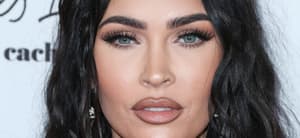 Megan Fox poses at an event