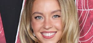 Sydney Sweeney smiling close up