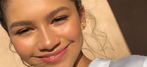 Zendaya poses looking glowing