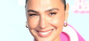 Gal Gadot smiles at a premiere