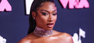 Megan Thee Stallion wearing a Brandon Blackwood dress and Jacob and Co. jewelry arrives at the 2023 MTV Video Music Awards
