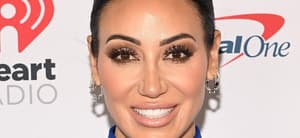 Melissa Gorga smiling at an event