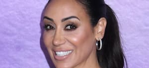 Melissa Gorga smiling at an event