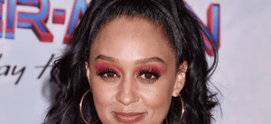 Tia Mowry at Spiderman premiere banner