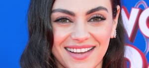 Mila Kunis smiling close up