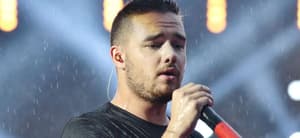 Liam Payne singing on stage