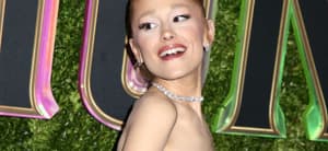 Ariana Grande poses at 'Wicked' NYC premiere.