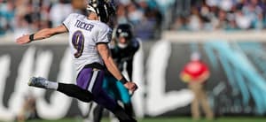 Justin Tucker kicking a football
