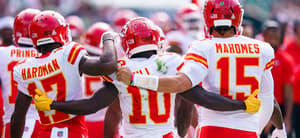 Mecole Hardman, Tyreek Hill, and Patrick Mahomes on NFL field