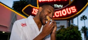 Man eating Arby's sandwich