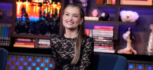 Lexi Wood posing in a black dress during an episode of "WWHL."