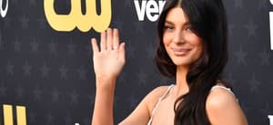 Camila Morrone waving