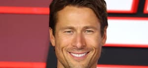 Glen Powell smiling
