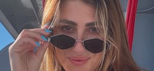 Emma Slater wearing sunglasses