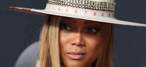 Tyra Banks wearing a hat