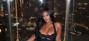 Antoniqua Brown in a black dress