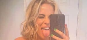 Paige VanZant sticking her tongue out in mirror