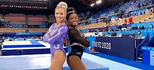 A photo showing MyKayla Skinner and Simone Biles