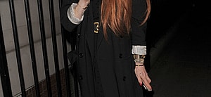Lindsay Lohan enjoys dinner at apos C apos restaurant in Mayfair with a male companion The pair appeared close with Lindsay showing the man pictures on her phone