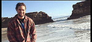 Paul Peden with long hair featured image