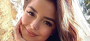 Demi Rose takes a selfie.