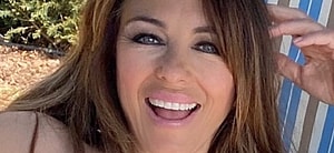 Elizabeth Hurley smiling outdoors