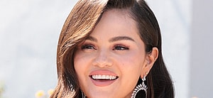 Selena Gomez smiles at an event