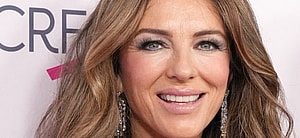 Elizabeth Hurley smiles at an event