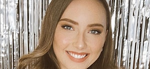 Hailie Jade smiling indoors