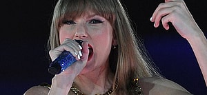 Taylor Swift singing at the Eras Tour