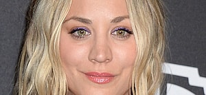 Kaley Cuoco smiles at an event